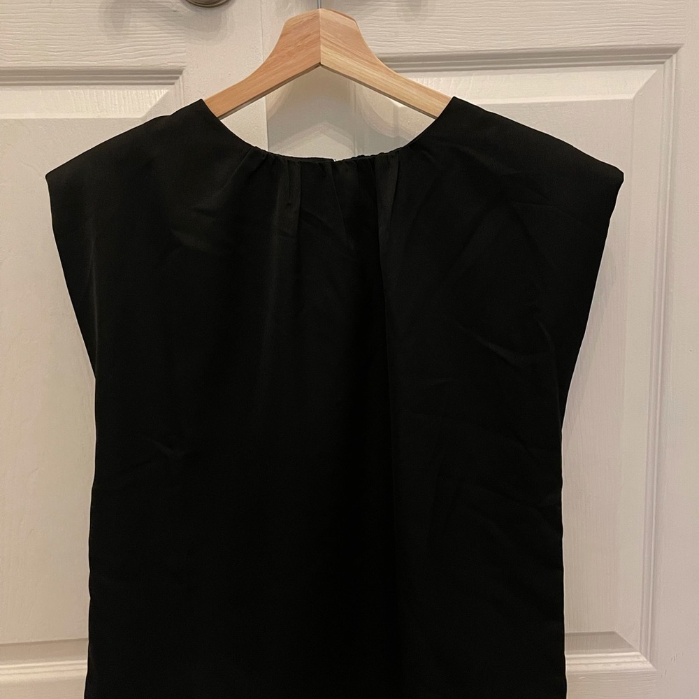 UOI Boutique black silk top, padded shoulders